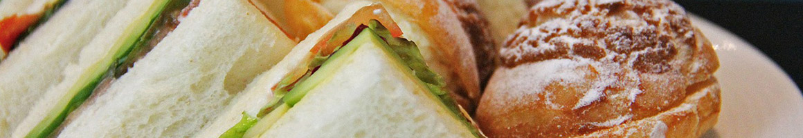 Eating Sandwich at Green Submarine restaurant in Fayetteville, AR.